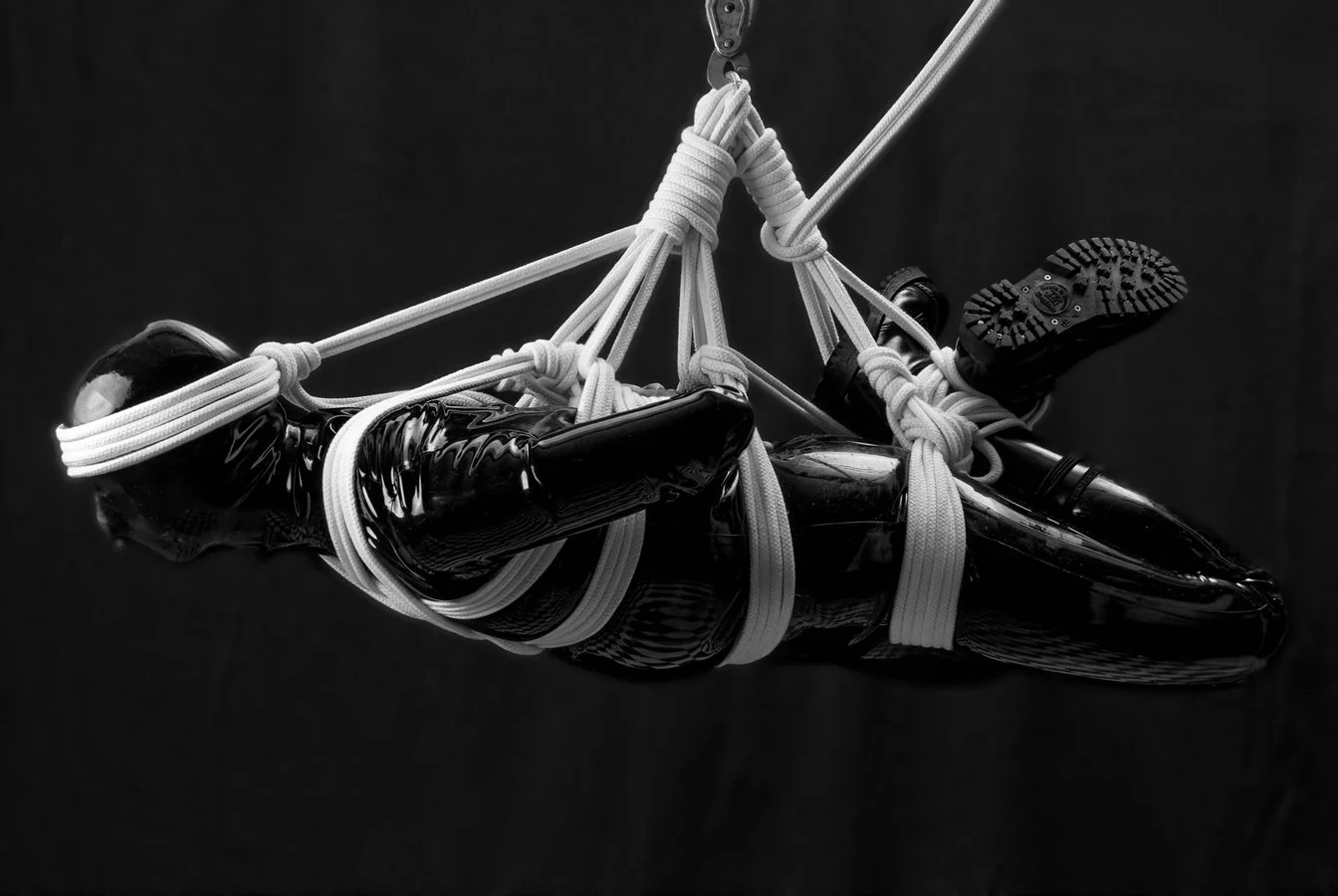 Freedom Suspended by @curiofoto — queer rope and rubber photography